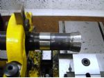 Testing the thread with a collet. The tool has been swung clear without moving the cross slide